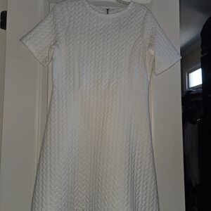 Cute winter white quilted dress. Size M.  35 inches in length.